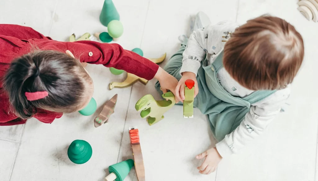 overhead shot of two children playing together